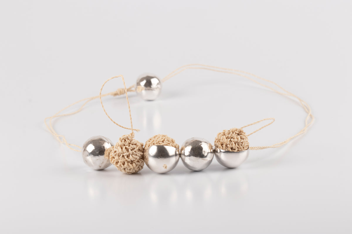Collar perlas de cumare