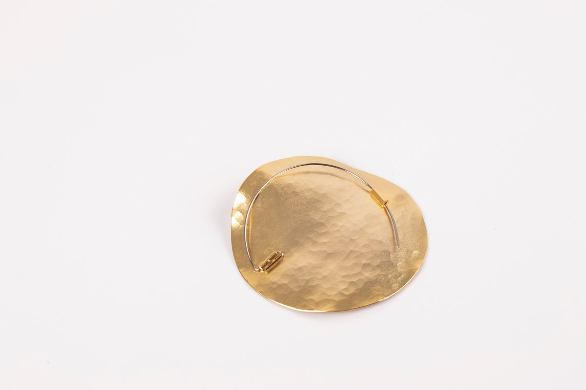 Broche sol dorado